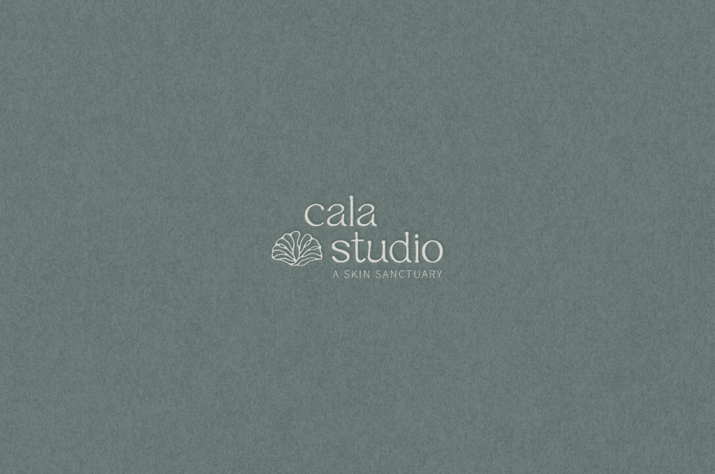 Embossed primary logo for Cala Studio, a luxury esthetician brand with shell icon and skin sanctuary tagline on textured neutral background.